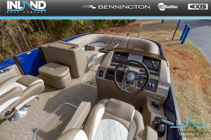 Slide: The Image of 2023 Bennington 23 LTSB boat interior with steering console and seating. - 10