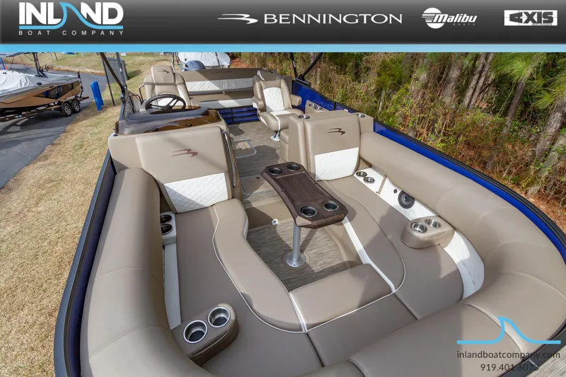 Slide: The Image of 2023 Bennington 23 LTSB pontoon boat interior with luxurious seating and cup holders. - 17