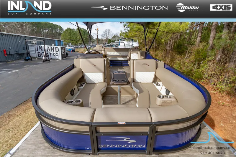 Slide: The Image of 2023 Bennington 23 LTSB pontoon boat with beige seating at Inland Boat Company. - 25