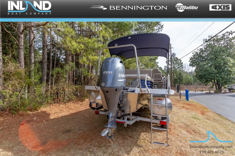 Slide: The Image of 2023 Bennington 23 LTSB pontoon boat with Yamaha 200 engine, displayed by Inland Boat Company. - 27