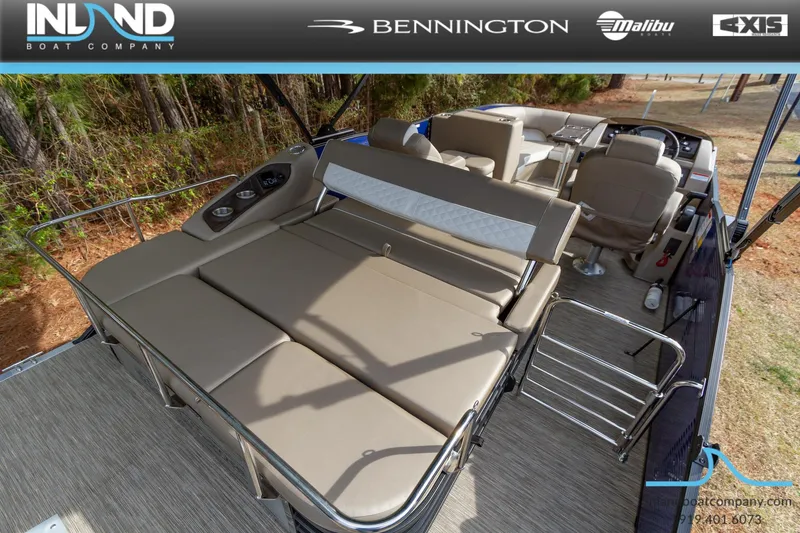 Slide: The Image of 2023 Bennington 23 LTSB pontoon boat with spacious seating and modern amenities. - 5