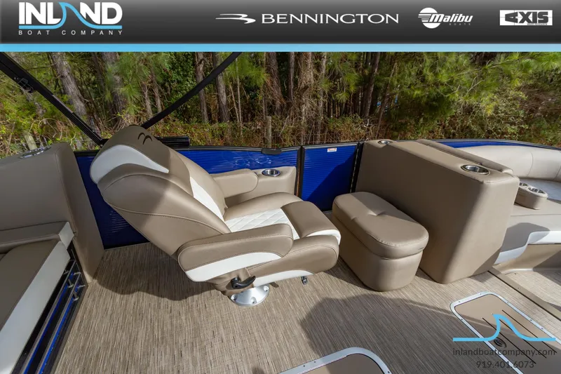 Slide: The Image of 2023 Bennington 23 LTSB boat interior with beige and white seating. - 8