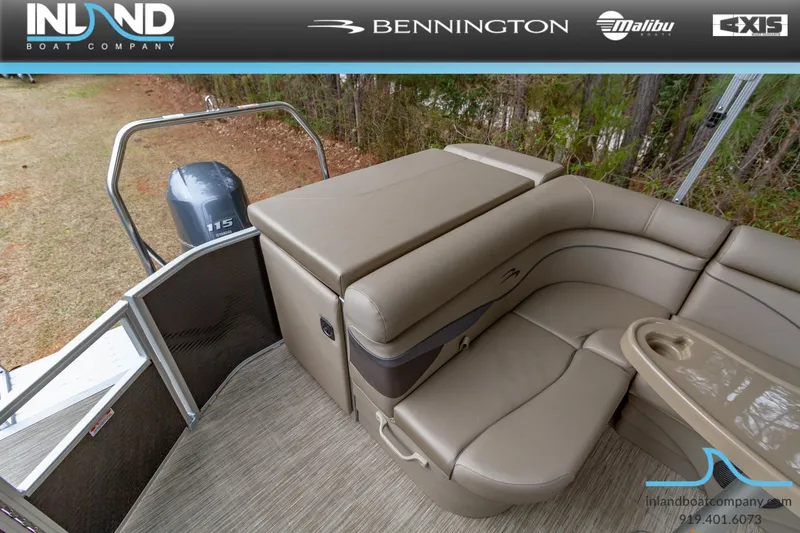 Slide: The Image of 2023 Bennington 22 SL pontoon boat with comfortable seating and 115 HP outboard motor. - 13