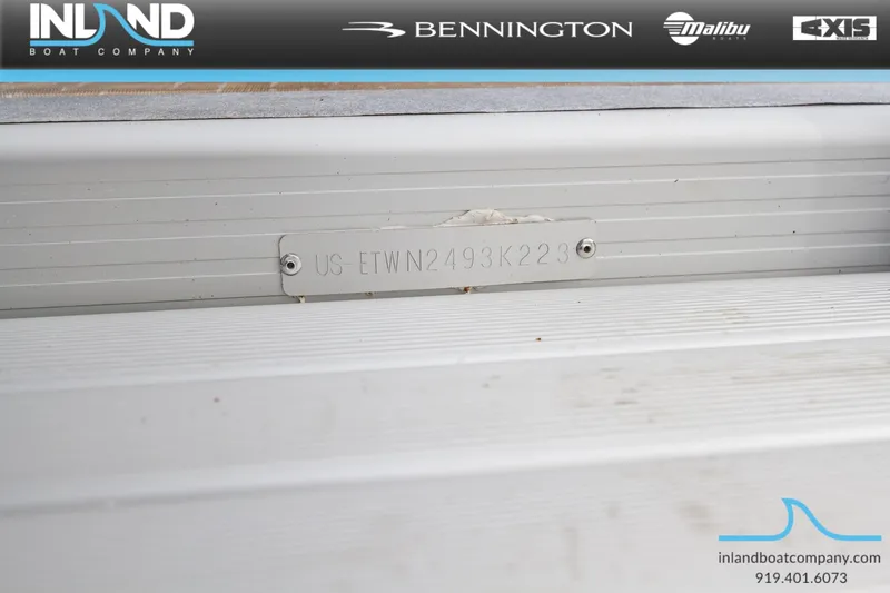 Slide: The Image of 2023 Bennington 22 SL boat identification plate at Inland Boat Company. - 23