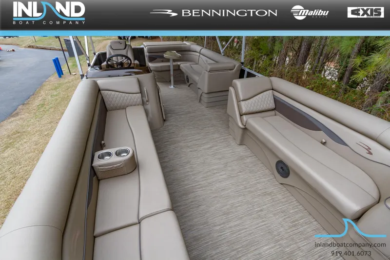 Slide: The Image of 2023 Bennington 22 SL pontoon boat interior with luxurious seating and modern design. - 5