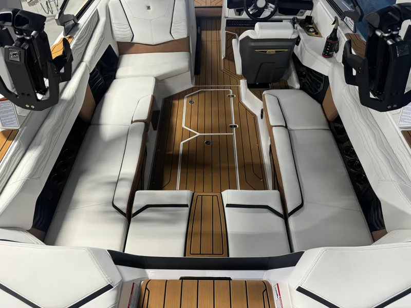 Slide: The Image of 2025 Nautique Super Air G23 interior with luxurious seating and sleek design. - 6