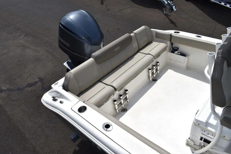 Slide: The Image of 2022 Key West 239FS boat with Yamaha outboard, featuring spacious seating and rod holders. - 12