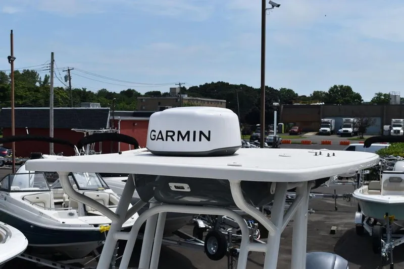 Slide: The Image of 2022 Key West 239FS boat with Garmin radar in a marina. - 24