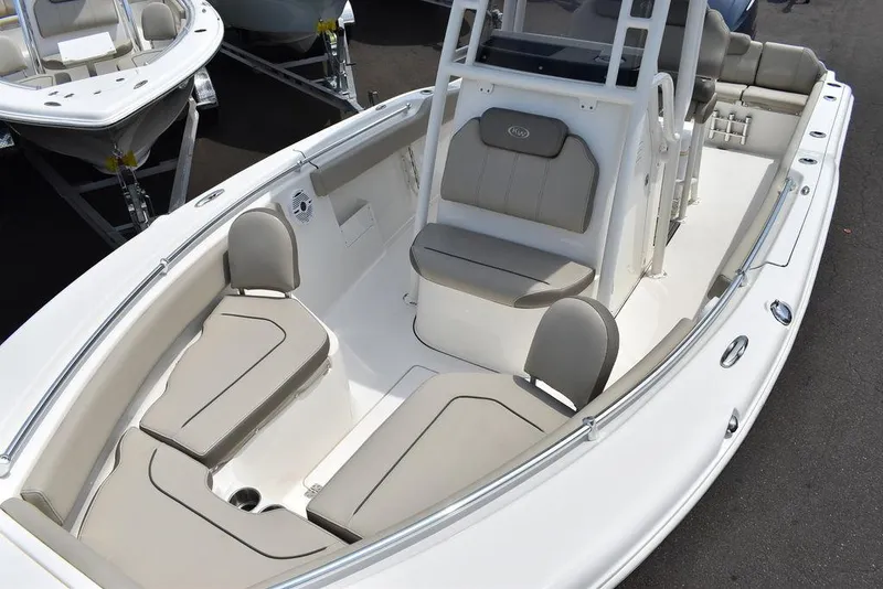 Slide: The Image of 2022 Key West 239FS boat interior with cushioned seating and modern design. - 25