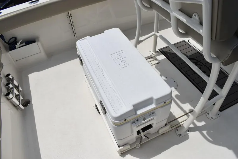 Slide: The Image of 2022 Key West 239FS boat interior with Igloo cooler on deck. - 31