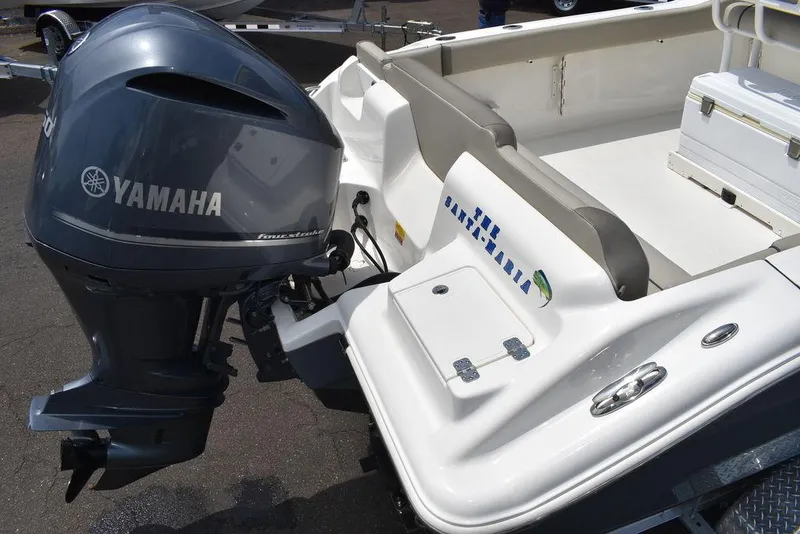 Slide: The Image of 2022 Key West 239FS boat with Yamaha outboard motor, rear view. - 9