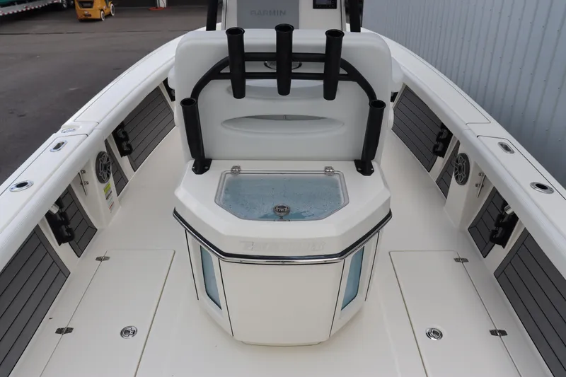 Slide: The Image of 2024 Pathfinder 2400 Open boat interior with rod holders and storage compartments. - 12