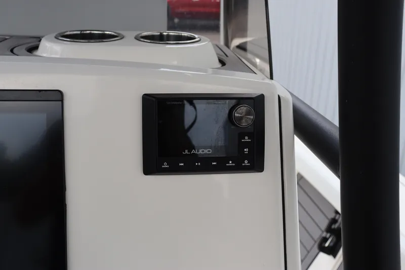 Slide: The Image of 2024 Pathfinder 2400 Open boat dashboard with JL Audio system. - 21