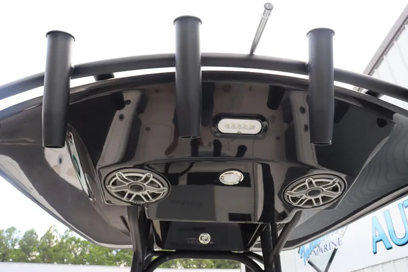 Slide: The Image of 2024 Pathfinder 2400 Open boat T-top with rod holders and speakers. - 26