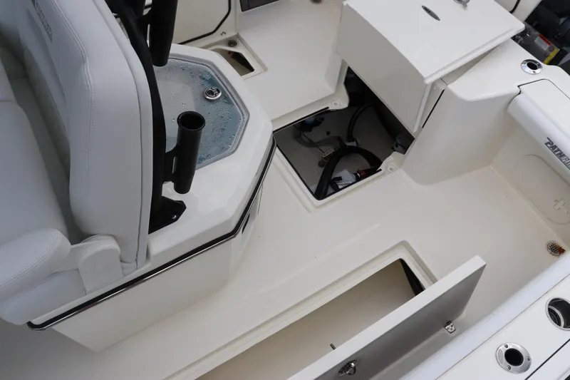 Slide: The Image of 2024 Pathfinder 2400 Open boat interior with storage compartments and seating. - 31