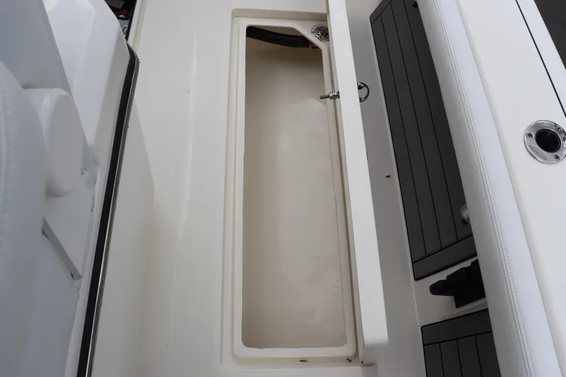 Slide: The Image of 2024 Pathfinder 2400 Open boat storage compartment. - 32