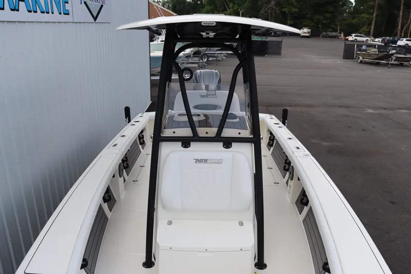 Slide: The Image of 2024 Pathfinder 2400 Open boat, front view, docked at a marina. - 6