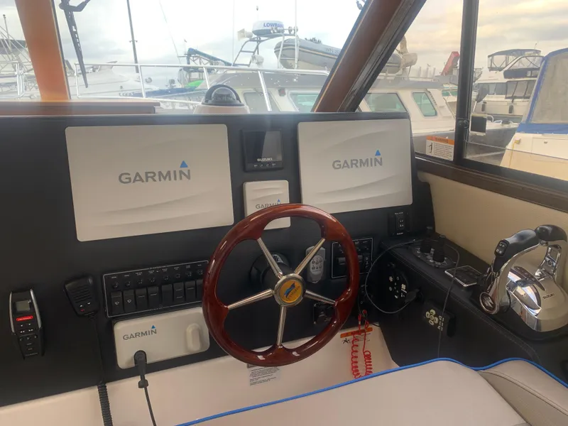 Slide: The Image of 2018 Cutwater C 302 Coupe helm with Garmin navigation system. - 11