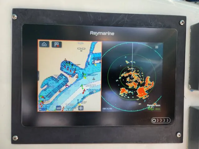 Slide: The Image of Raymarine navigation and radar display on Ocean Cat 49, 2000 model boat. - 10