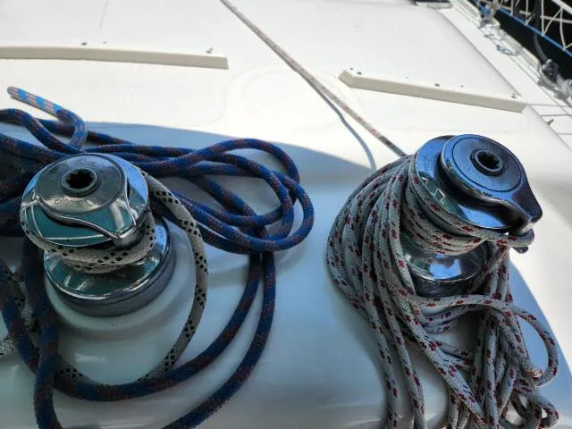 Slide: The Image of Sailboat winches and ropes on Ocean Cat 49, 2000 model. - 13