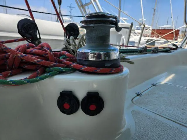 Slide: The Image of Sailboat deck with winch and colorful ropes, Ocean Cat 49, 2000 model. - 16