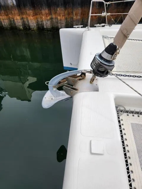 Slide: The Image of Anchor and bow of 2000 Ocean Cat 49 catamaran docked. - 17