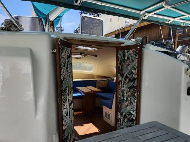 Slide: The Image of Interior view of 2000 Ocean Cat 49 sailboat with floral door panels. - 30