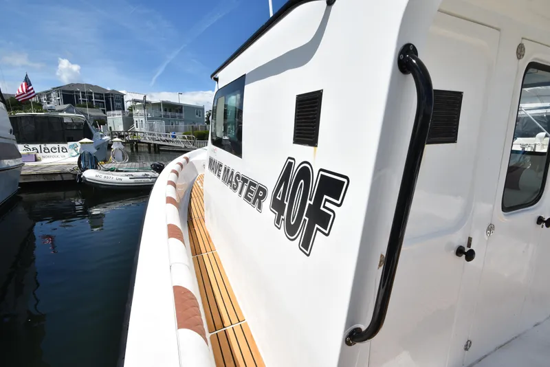 Slide: The Image of Custom Aljerewy Wave Master 40F boat docked at marina, 2023 model. - 19