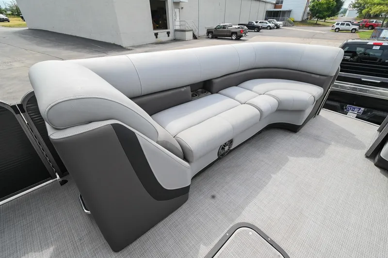 Slide: The Image of 2022 Manitou 25 Oasis VP pontoon boat with luxurious gray seating. - 30