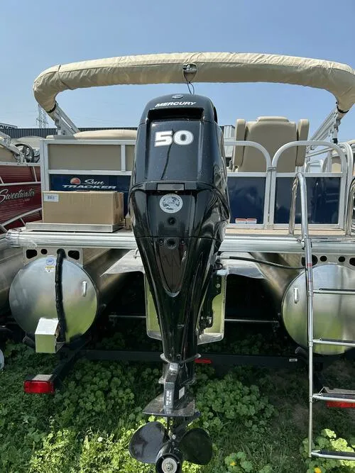 Slide: The Image of 2025 Sun Tracker Bass Buggy 16 XL Select pontoon boat with Mercury 50 HP outboard motor. - 7