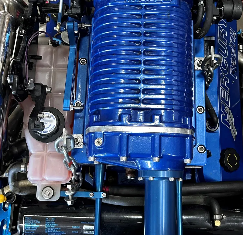 Slide: The Image of Close-up of a 2005 Cobalt 343 engine with Mercury Racing components. - 4