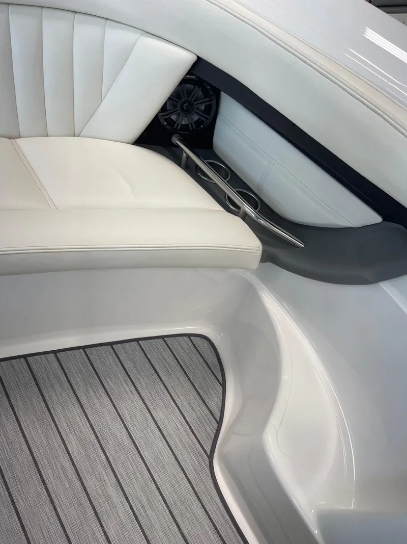Slide: The Image of Luxury interior of 2005 Cobalt 343 boat with white seating and cup holders. - 9