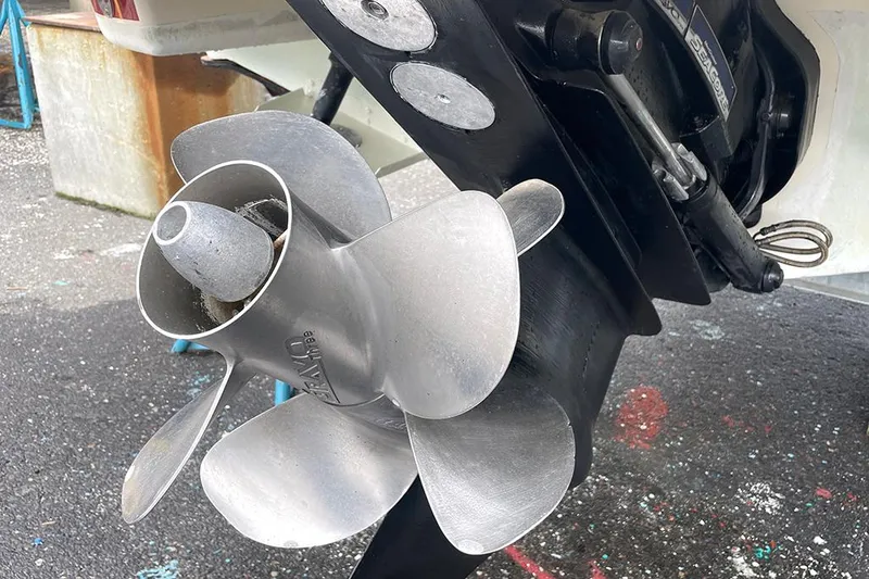 Slide: The Image of Close-up of 2022 Chris-Craft Launch 27 boat propeller and stern drive. - 10