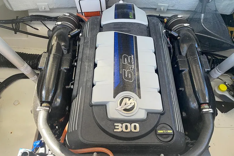 Slide: The Image of 2022 Chris-Craft Launch 27 engine compartment featuring a 6.2L 300 HP engine. - 12