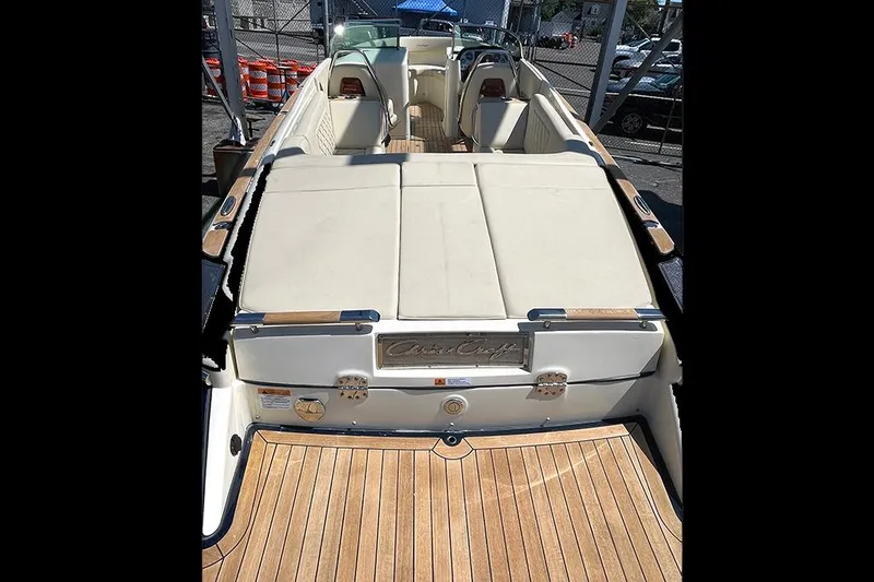 Slide: The Image of 2022 Chris-Craft Launch 27 boat with teak deck and luxurious seating. - 3