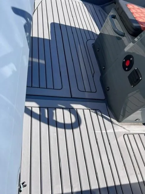 Slide: The Image of 2024 Highfield Sport 460 boat deck with sleek, modern design and high-quality materials. - 11