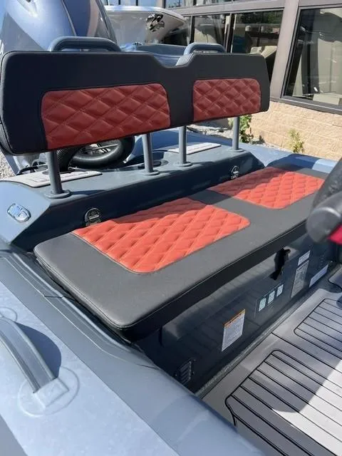 Slide: The Image of 2024 Highfield Sport 460 boat with red and black quilted seating. - 12