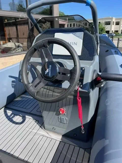 Slide: The Image of 2024 Highfield Sport 460 boat cockpit with Garmin navigation system. - 5