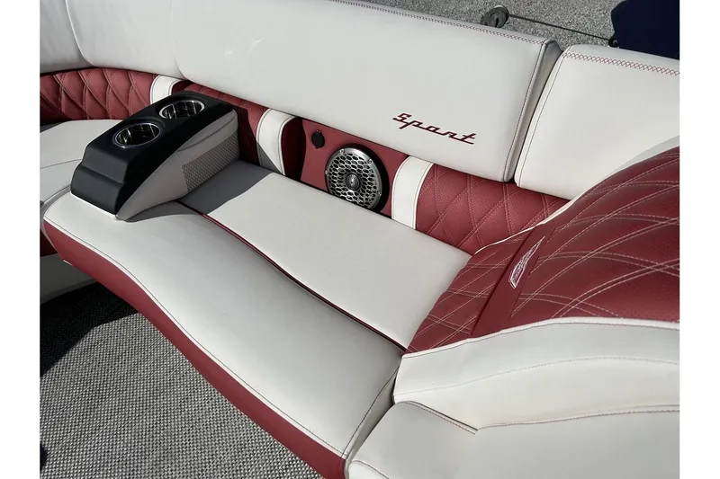 Slide: The Image of 2023 Bennington QX Sport 25 boat interior with red and white leather seats. - 6