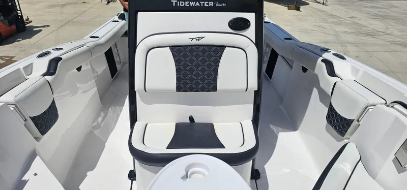 Slide: The Image of 2023 Tidewater 232 LXF boat interior with stylish seating and modern design. - 24