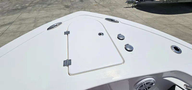 Slide: The Image of 2023 Tidewater 232 LXF boat deck with storage hatch and fittings. - 27