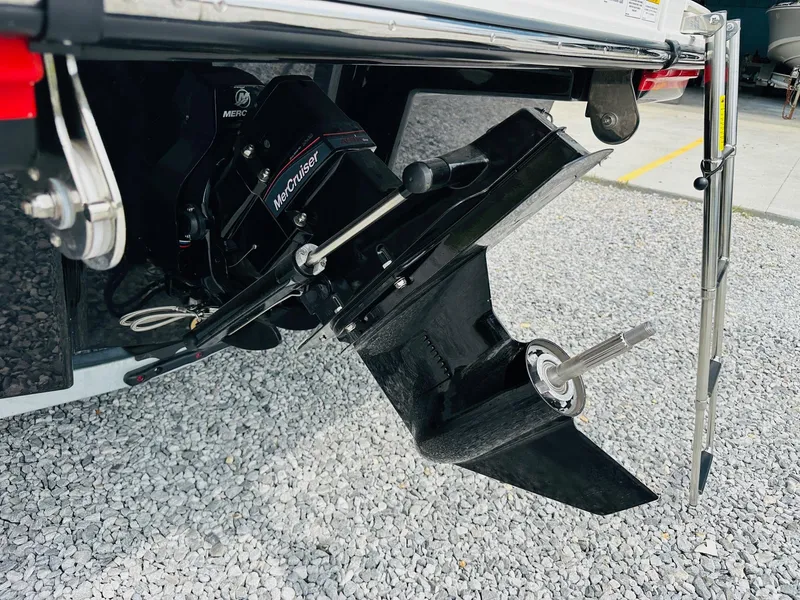 Slide: The Image of Close-up of the 2025 Sea Ray SPX 210 boat's MerCruiser engine and propeller. - 8