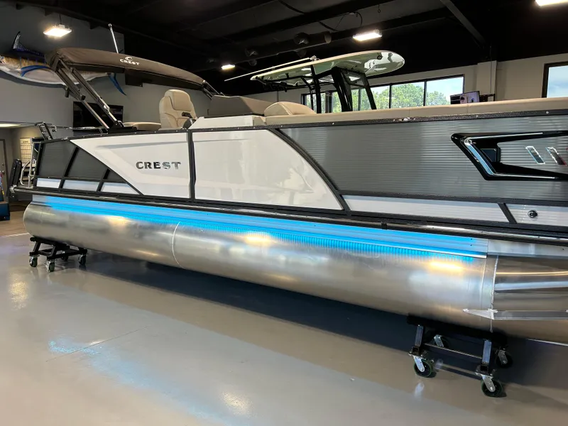 The Image of 2024 Crest Caribbean Platinum 250 SLRC CP3 pontoon boat in showroom. - 1