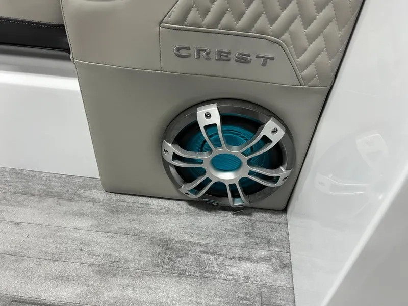 Slide: The Image of 2024 Crest Caribbean Platinum 250 SLRC CP3 boat interior speaker and seating detail. - 14