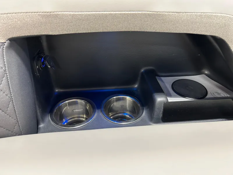 Slide: The Image of 2024 Crest Caribbean Platinum 250 SLRC CP3 cup holders and storage compartment. - 3