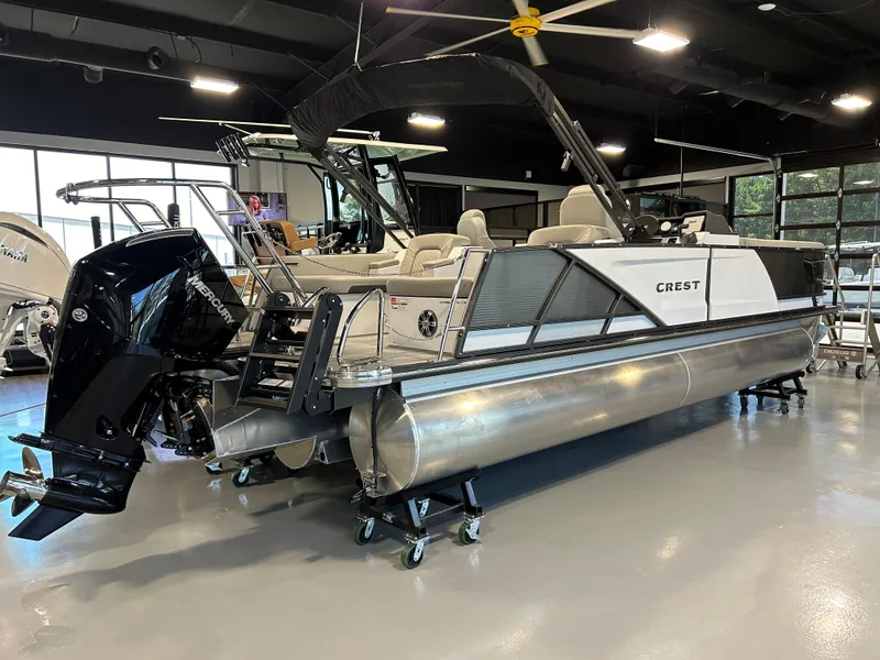 Slide: The Image of 2024 Crest Caribbean Platinum 250 SLRC CP3 pontoon boat in showroom. - 6