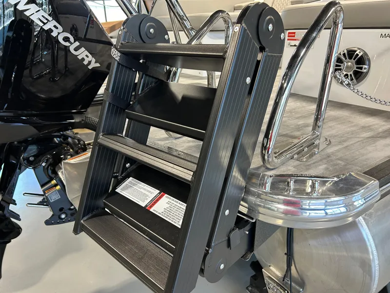 Slide: The Image of 2024 Crest Caribbean Platinum 250 SLRC CP3 boat with Mercury engine and boarding ladder. - 8