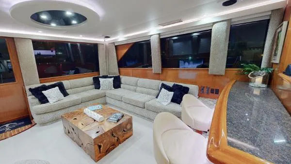 Slide: The Image of Luxurious interior of a 1999 Viking 72 Sport Fish yacht with modern furnishings. - 31