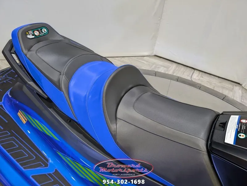 Slide: The Image of 2024 Yamaha Boats VX® Limited HO seat, blue and black design, Broward Motorsports logo. - 9