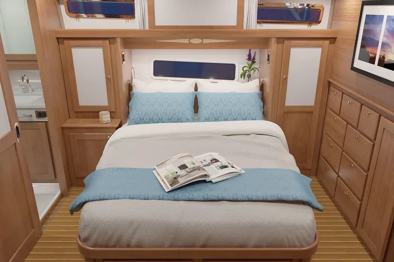 Slide: The Image of Luxurious bedroom interior of 2026 Sabre 51 Salon Express yacht with elegant wood finishes. - 17